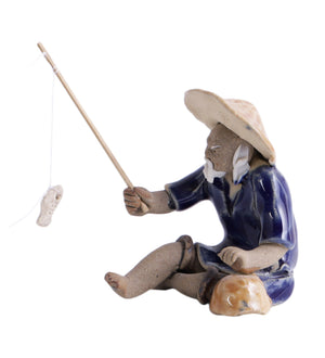 Fisherman in blue with fishing rod bonsai miniature figurine