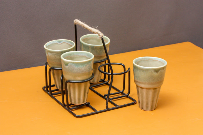 Ceramic tea glasses and metal stand