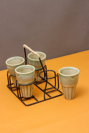 Ceramic tea glasses and metal stand