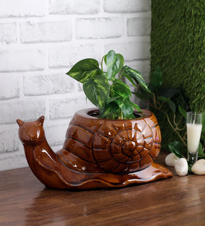 Ceramic snail shaped planter