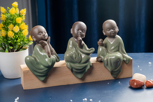 Set Of Three Monks With Wooden Base