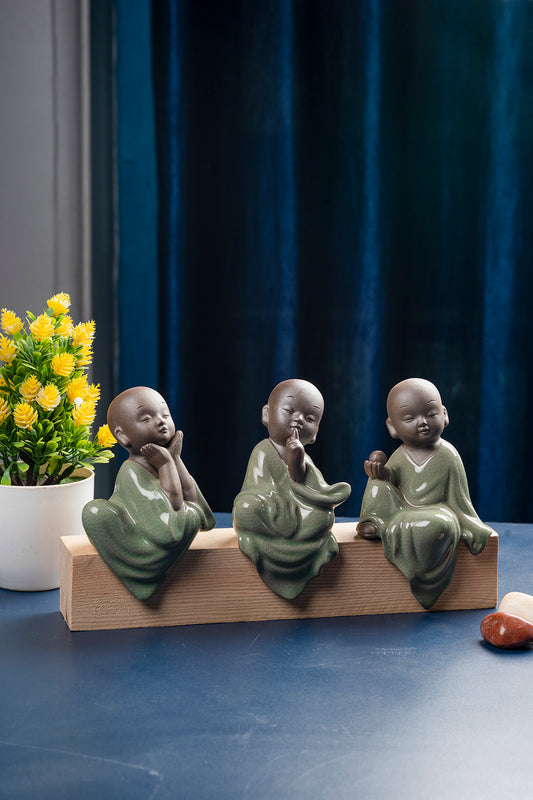 Set Of Three Monks With Wooden Base