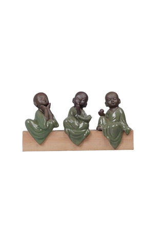 Set of three monks with wooden base