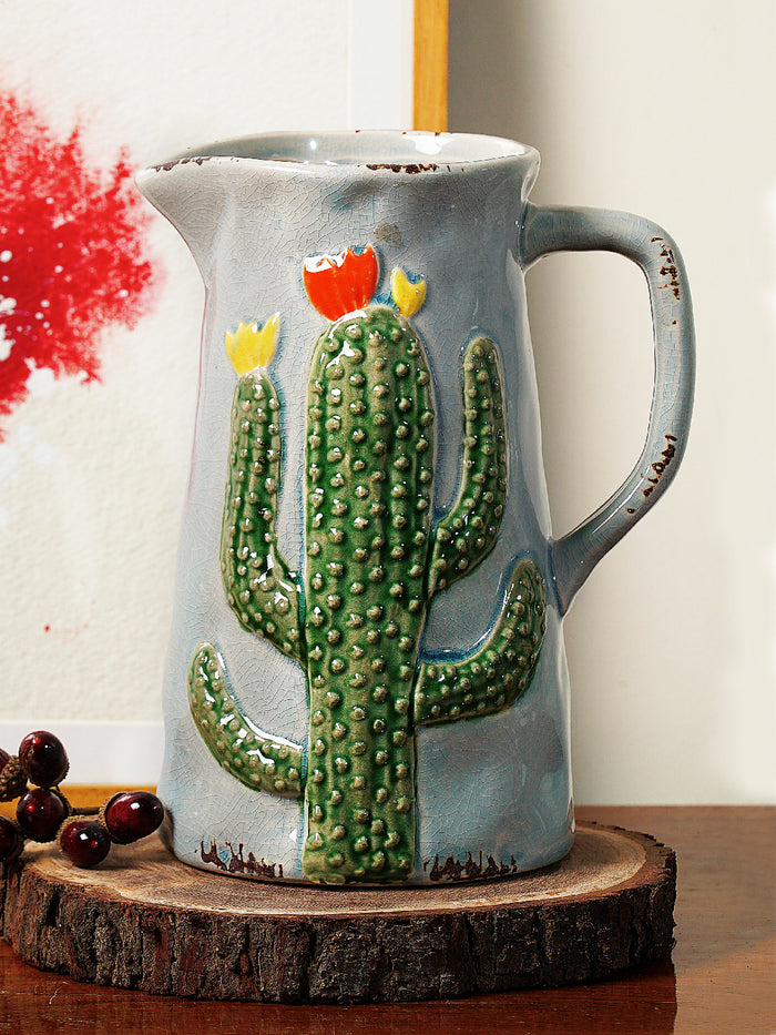 Jug shaped ceramic vase with cactus deisgn