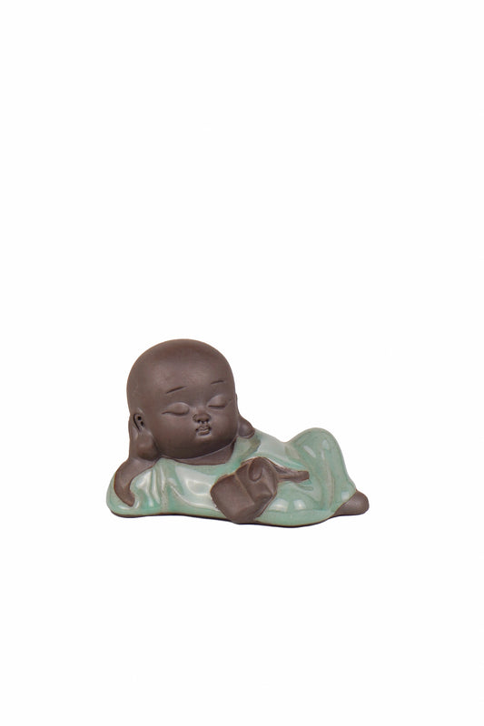Lying monk Holding Book Decor
