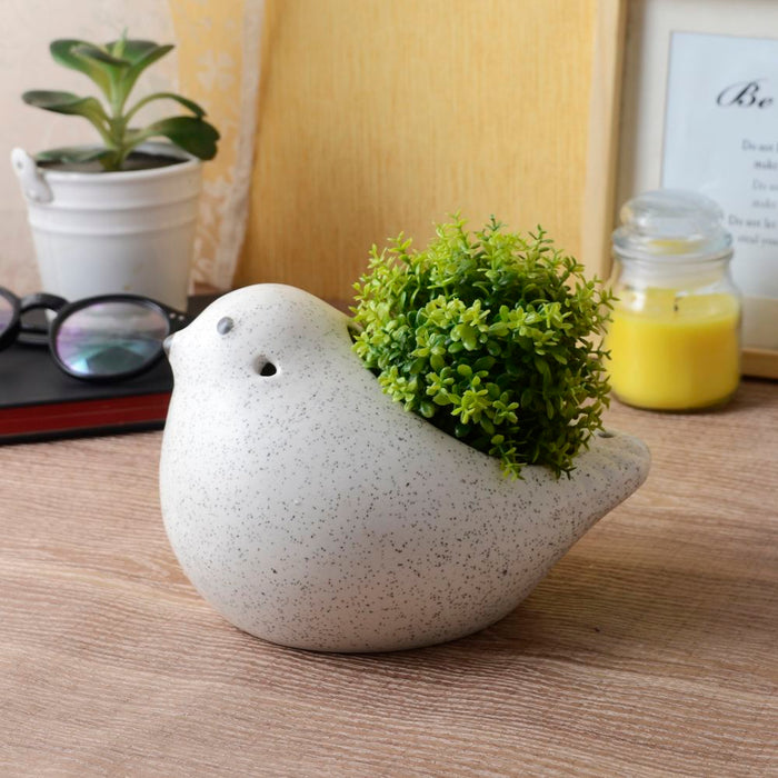 Dotted white bird shaped ceramic planter