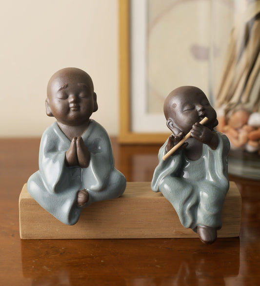 Pair Of Monk Praying And Playing Flute