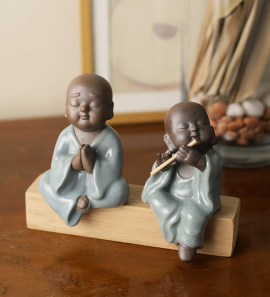 Pair Of Monk Praying And Playing Flute