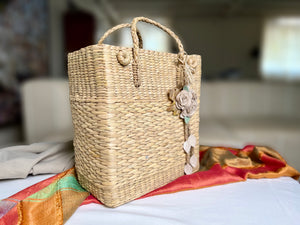Kauna grass bag with flower and decor